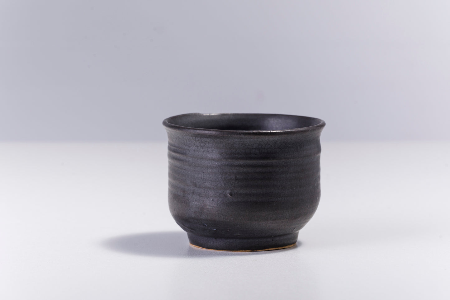 Japanese Tea Cup Raku Ceramic Unique Glass Bottom Black Raku