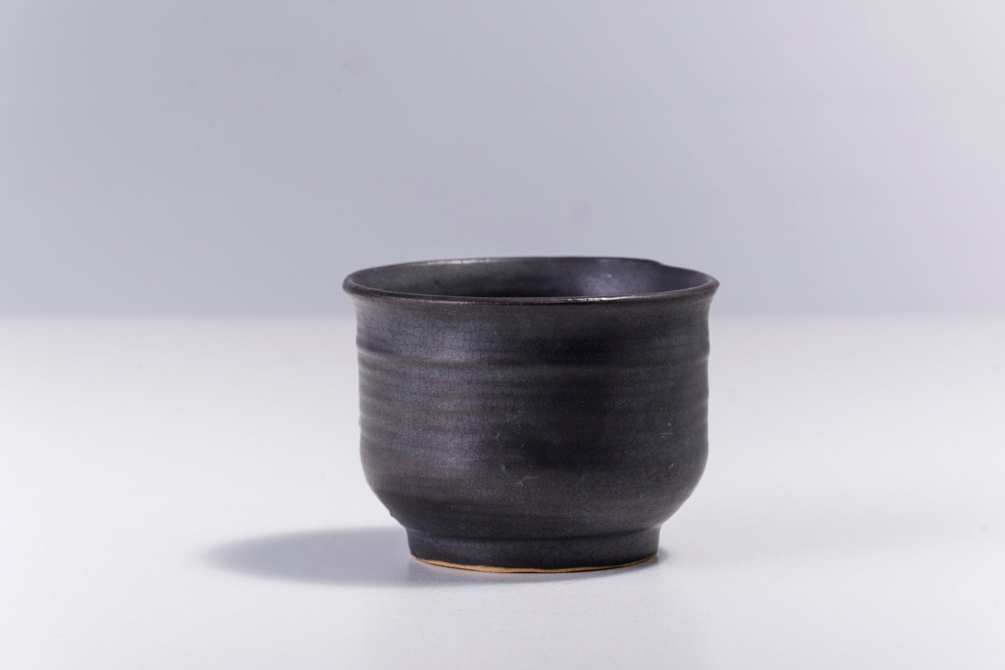 Japanese Tea Cup Raku Ceramic Unique Glass Bottom Black Raku